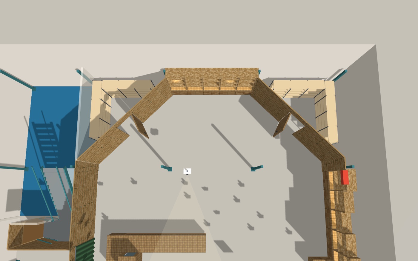 The corner closets from above, their pivot doors open, racks inside